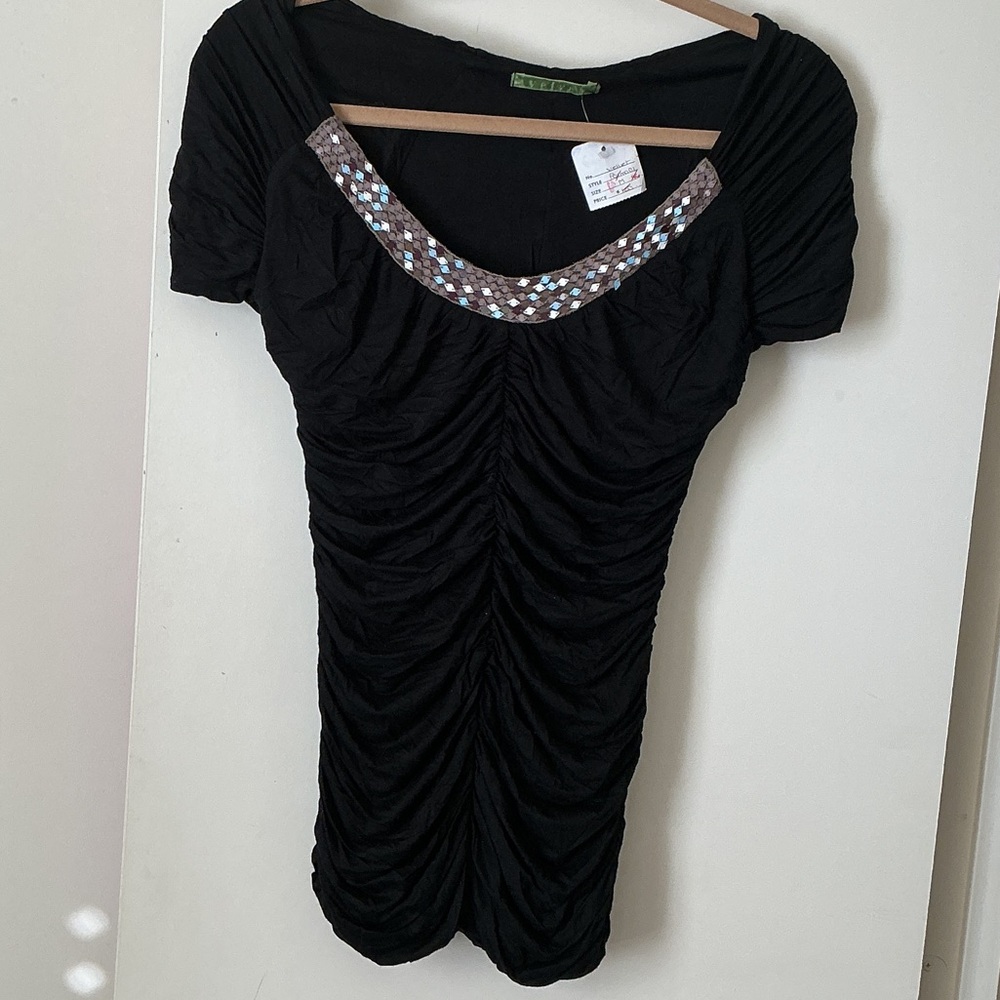 Black Ruched Top with Sequin Detail from  ANTHROPOLOGIE.